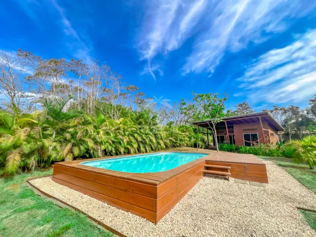 Turnkey Rental Opportunity: Charming Lodges with Pool Near Santa Teresa Beach