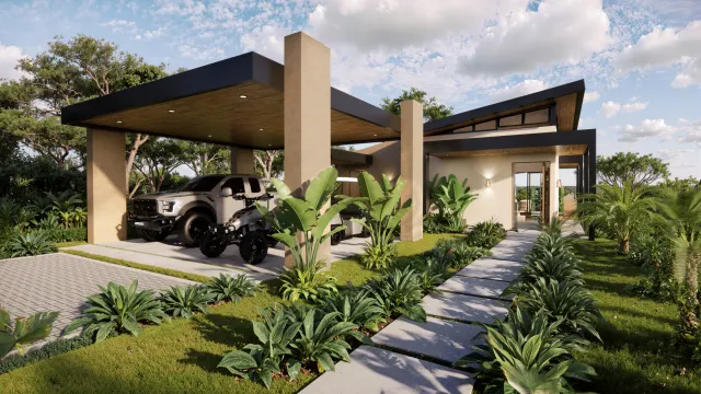 Exterior shot of a modern house with a large carport holding a pickup truck and quad, alongside a stone walkway and manicured garden.
